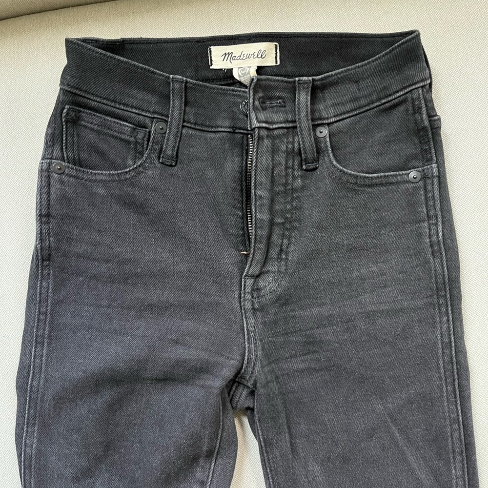 Black denim washed Madewell jeans.